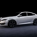White Modern Sedan Car With Sleek Exterior Design And Black Alloy Wheels