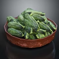 Pile of Fresh Green Zucchini in Brown Clay Bowl on Dark Background