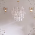 Elegant Crystal Lighting Combination With Chandelier And Wall Sconces On White Carved Wall