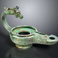 Ancient Bronze Tea Utensil With Dragon Head Design And Vintage Appearance