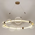 Modern Gold Chandelier with Intertwined Circular Rings and Transparent Glass Balls for Contemporary Interior Lighting
