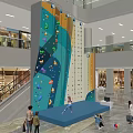 Indoor Rock Climbing Wall With Colorful Holds In Multi Level Shopping Mall
