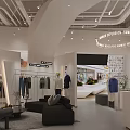 Modern Minimalist Clothing Store Interior With Curved White Walls Clothing Racks And Sofa
