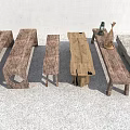 Various Designed Wooden Stools With Different Shapes Sizes And Small Table With Bottle Decorations