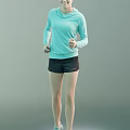 A Woman Wearing Light Blue Hooded Long Sleeve Top and Black Shorts Jogging