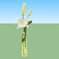 White Lily Flower Arrangement With Buds In Green Vase And Pearl Decorations