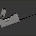 Gray Rectangular Communication Device With Black Antenna Decorative Accent And Long Slender Rod