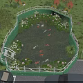 Scenic Garden Water Feature Fountain With Green Fence Water Lilies Koi Fish And Lotus Flowers