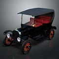 Vintage Classic Car With Black Body Red Seats And Orange Spoked Wheels