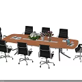 Wooden Conference Table Surrounded By Black Office Chairs With Potted Plants Pink Flowers And Documents