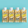 Four Bottles of Orange Juice Drink with Orange Packaging and Fist Graphic