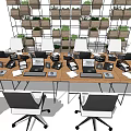 Modern Office Conference Table with Laptops Office Chairs and Green Plant Wall