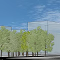 Municipal Road Featuring Two Way Traffic Lanes Multiple Vehicles Streetlights Transparent Barriers And Clear Sky