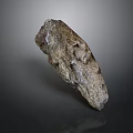 Natural Brownish Gray Stone With Rough Surface On Dark Background