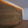 Wavy Wooden Wall with Curved Stripes Design in Modern Interior With Wooden Floor