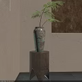 Decorative Potted Fern Plant In Teal Ceramic Vase On Wooden Pedestal Against Beige Wall