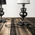 Modern Table Lamps With Black And White Gradient Shades And Metal Bases On Wooden Floor