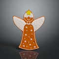 Angel Shaped Gingerbread Cookie With White Star Decorations And Yellow Star On Head