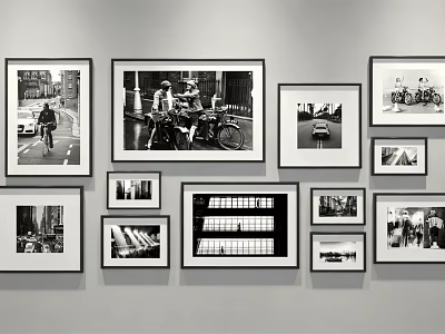 Black and White Photo Wall with Various Sizes Frames and Street Scenes 3d model