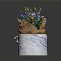 Vibrant Purple Flowers in White Pot with Burlap Wrap and Green Foliage