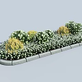 Colorful Garden Shrubs With Yellow Green Foliage Stone Edging And White Flowers