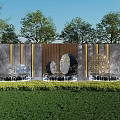 Outdoor Black Circular Sculptures With Water Features Against Gray Wall Golden Pillars And Green Lawn