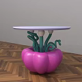 Coffee Table With Pink Pumpkin Shaped Base Green Curved Supports And White Round Top