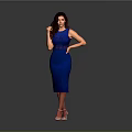 Woman Posing in Blue Fitted Dress with Hand on Hip and High Heels Gray Background