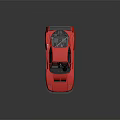 Red High Performance Sports Car With Sleek Exterior And Large Rear Spoiler