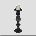 Decorative Black Candle Holder Stand With White Candle And Intricate Carved Design Details