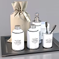 Household Laundry Supplies With White Bottles Jars And Cloth Bag On Tray