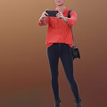 Woman Taking Selfie With Smartphone In Red Shirt And Dark Jeans With Black Bag