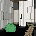Modern Lobby Interior With Green Spherical Garden Ornament And Yellow Grasses