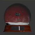 Decorative Snow Globe With Red Base And Traditional Architecture Interior Design