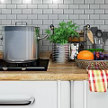 White Kitchen Cabinets With Wooden Countertop Sink Kitchen Utensils And Fresh Fruits