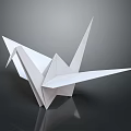 Minimalist White Paper Origami Crane Decorative Ornament For Tabletop Decoration On Dark Reflective Surface