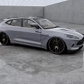 Modern Gray Sports Car With Stylish Black Rims And Sleek Exterior In Showroom Setting