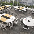Spacious Bright Meeting Room With Round Oval Conference Tables White Wooden Tops And Chairs