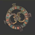 Ancient Metal Clothing Accessory Featuring Colorful Inlays and Dragon Pattern Design