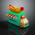 Green Food Truck With Large Hot Dog On Top And Red White Striped Awning
