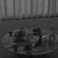 Circular Marble Table With Green Limes Vase Branches And White Curtain Background