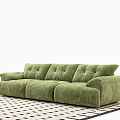 Green Velvet Three Seater Sofa With Tufted Design On Black And White Checkered Rug