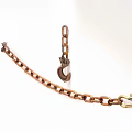 Sturdy Metal Hook With Copper Colored Chain For Hanging And Decorative Use