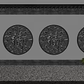 Traditional Chinese Building Exterior Wall With Gray Stone Circular Fu Characters Reliefs And Green Plants