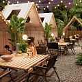 Outdoor Café With Tent like Structures String Lights Green Plants Wooden Tables on Gravel Floor