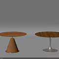 Two Round Dining Tables Featuring Wooden Tabletops And Distinct Bases Wooden Cone And Metal Stand