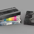 Classic Digital VHS Video Cassettes Stacked With Colorful Case And Black Design