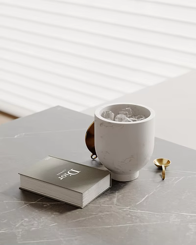 Decorative Ornament Set With White Marble Container Silver Book And Gold Spoon On Gray Tabletop 3d model