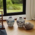 Traditional Blue And White Patterned Ceramic Jars With Gray Vessel On Wooden Floor By Window