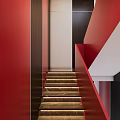 Stylish Red Staircase Interior With Dark Wooden Door Marble Steps Red Walls And Green Plant